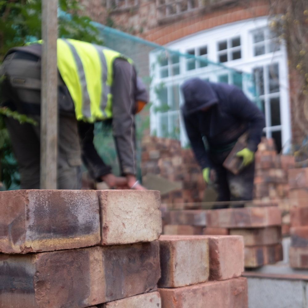 Solihull Home Improvements team installing block paving driveway in Solihull